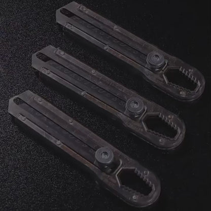 Cutter avec lame rétractable gris